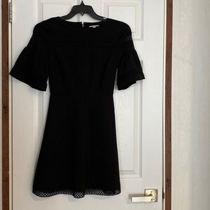 Black Short puff sleeve dress.